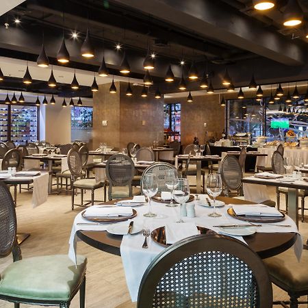 Hotel Regal Pacific Сантьяго Экстерьер фото Restaurant in the hotel